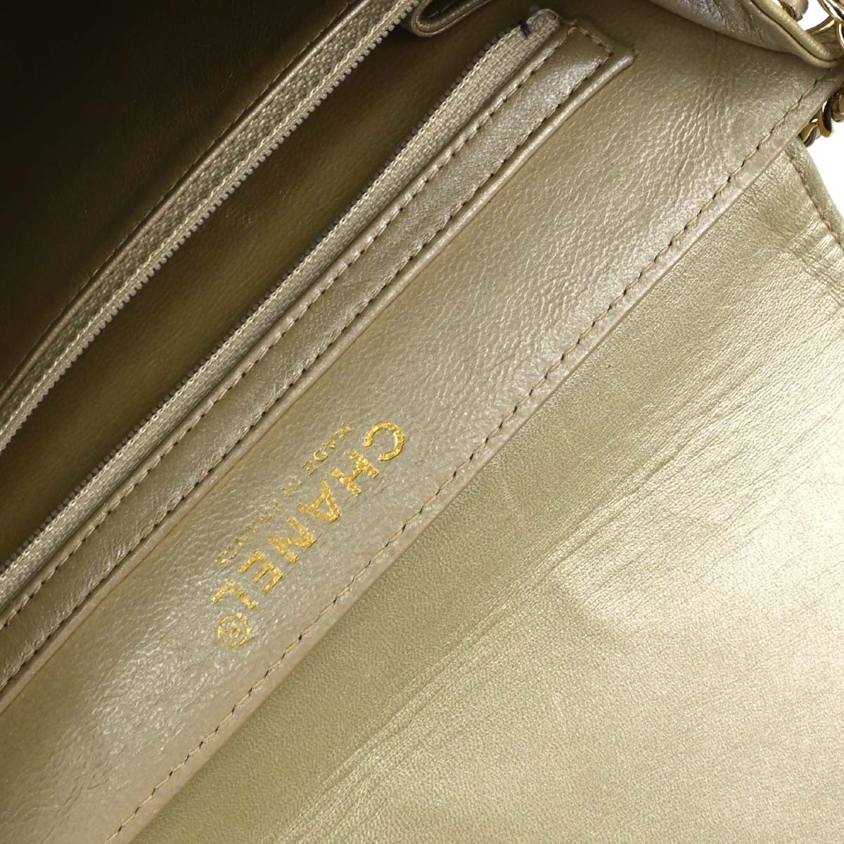 Chanel Choco Bar Mademoiselle Lock Vintage Shoulder Bag in Gold Lambskin