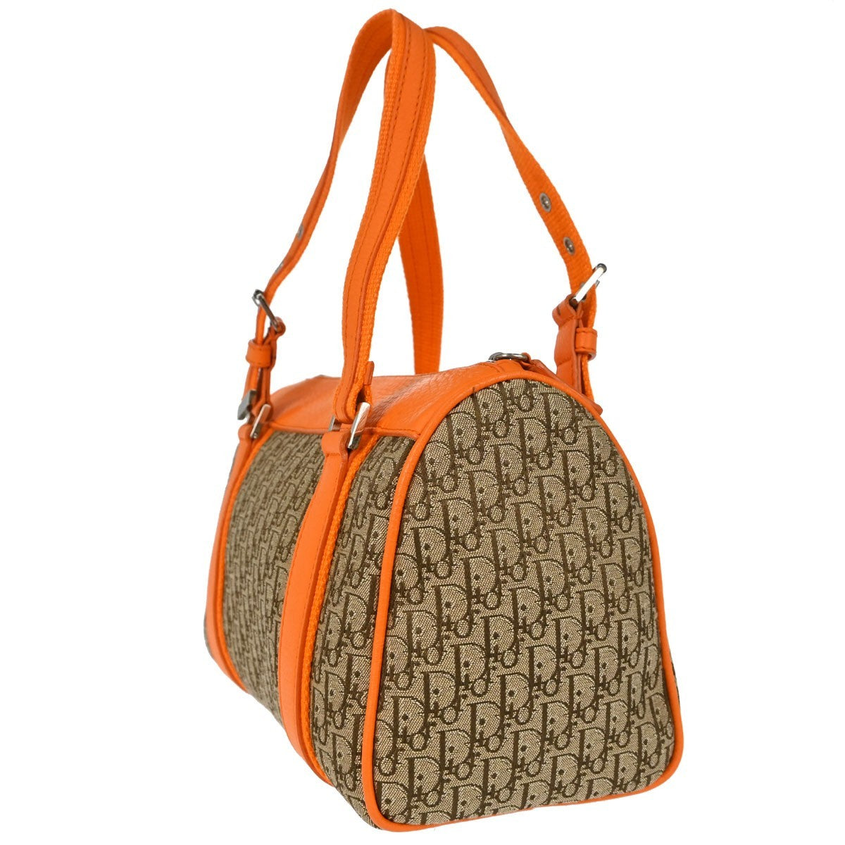 Christian Dior Street Chic Trotter Vintage Handbag in Beige and Orange Trotter Canvas and Leather