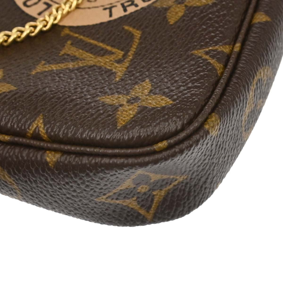 Louis Vuitton Monogram Mini Pochette Accessoires Handbag