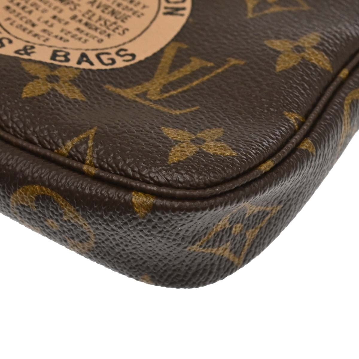 Louis Vuitton Monogram Mini Pochette Accessoires Handbag