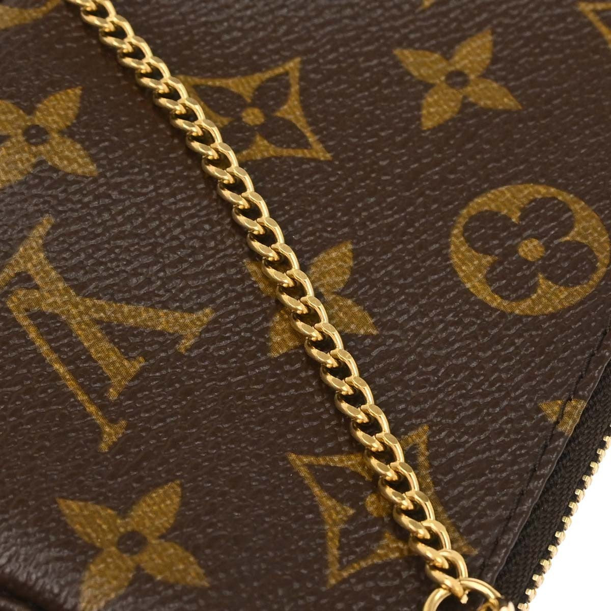 Louis Vuitton Monogram Mini Pochette Accessoires Handbag